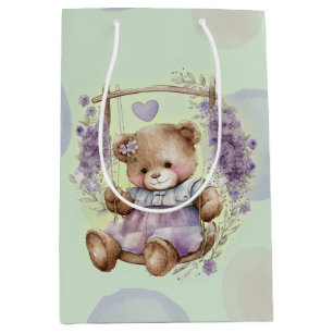 Brauner Teddybär Schwingen Lavendelkleid und Polka Mittlere Geschenktüte