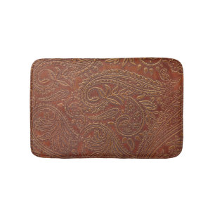 Braunes Leder, gearbeitete Blumenmuster. Badematte