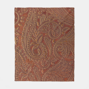 Braunes Leder, gearbeitete Blumenmuster. Fleecedecke