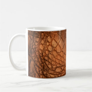 Braunes Leder mit einem Muster in Form eines Scal Kaffeetasse
