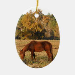 Braunes Pferd im Gelbbaumfeld Keramikornament
