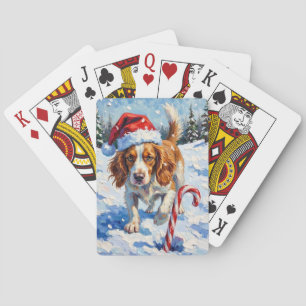 Bretonischer Spaniel Hund zeigt auf Weihnachtsbonb Spielkarten