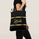 Bride Black Gold elgant mutige Hochzeit Tasche<br><div class="desc">Zwei Imitate Goldbänder,  mit dem Wort: Braut in einem handgeschriebenen Stil,  goldene Buchstaben. Elegante und zeitlose schwarze Hintergrundfarbe.</div>
