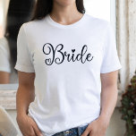 Bride Script Heart White Bachelorette T-Shirt<br><div class="desc">Niedlich modernes Design für die Braut zu sein. Das Wirble Wort Braut hat ein Herz und wird bei einem Bachelorette-Ereignis sicherlich bemerkt werden. Kann für das Abendessen der Probe getragen werden,  zusammen mit Ihrer Hochzeitsfeier.</div>