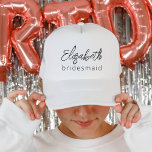 Bridesmaid Modern Minimalist Script Bachelorette Truckerkappe<br><div class="desc">Elevate your bachelorette party style with our "Bridesmaid Modern Minimalist Script" Trucker Hat, a chic and trendy token of gratitude for your bridal party. This hat effortlessly combines contemporary aesthetics with minimalist charm, making it the perfect keepsake for your bridesmaids. Crafted with care, it showcases the word "Bridesmaid" in an...</div>