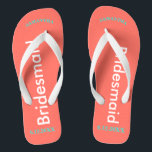 Bridesmaid NAME Coral Flip Flops<br><div class="desc">Helle Küstenkoralle mit Bridesmaid in weißem Text geschrieben. Name und Datum der Hochzeit ist hübsch türkisblau. Personalisieren Sie die Namen Ihrer Brautmädchen in groben Großbuchstaben. Hübsches Strandziel Flip Flops,  um als Teil der Hochzeitsfeier Gunst zu geben. Ihre Hochzeitsfeier wird Liebe haben ihre eigenen personalisierten Paar. Originale Entwürfe von TamiraZDesign.</div>