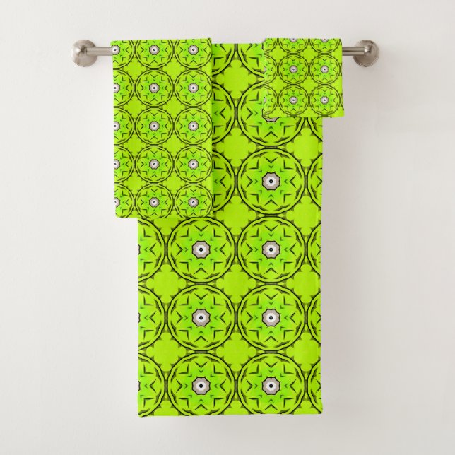 Bright green towel with intricate circular pattern badhandtuch set (Insitu)