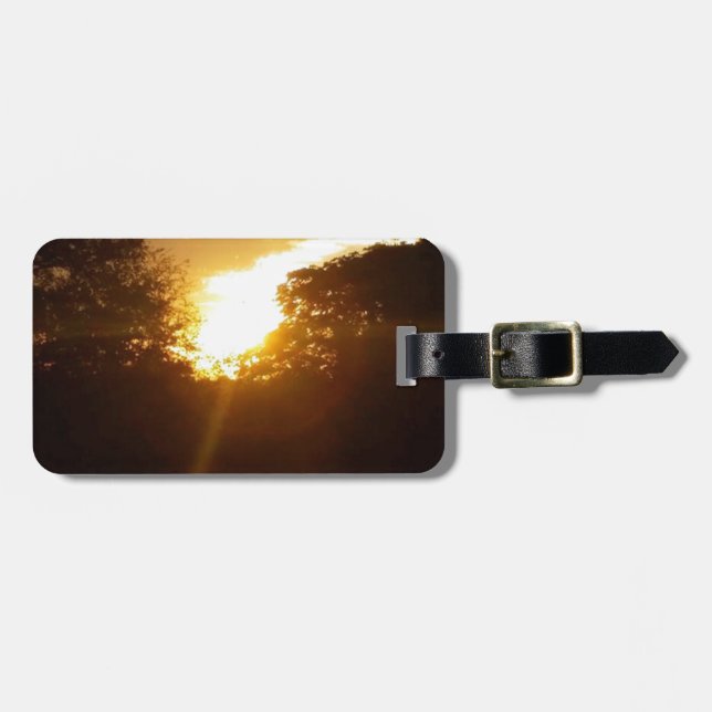 Brillanter Sonnenaufgang über den Bäumen Gepäckanhänger (Vorderseite horizontal)