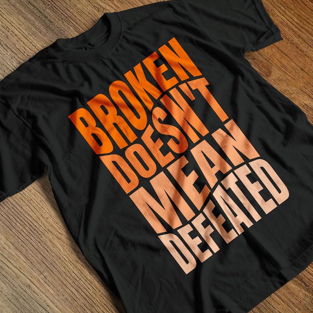 Broken Doesn’t Mean Defeated  T-Shirt (Von Creator hochgeladen)