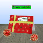 Brother family red christmas parcel feiertagskarte<br><div class="desc">Personal Christmas greetings for your brother and his family. The card has the appearance of a parcel with a colorful pattern of stylized snowflakes in golden and green colors on a red background. The parcel is tied with a golden 'ribbon', and has a 'gift tag' with the message "Happy Christmas...</div>
