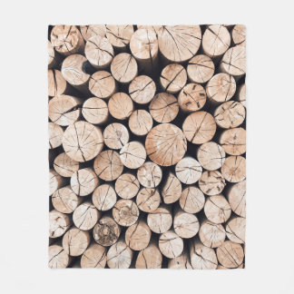 Brown wooden log lot fleecedecke