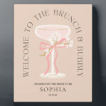 Brunch und Bubbly Champagne Brautparty Willkommen Fotoplatte<br><div class="desc">Dieses schöne Schild ist der perfekte Weg, um Ihre Brautpartys zu empfangen! Bei der Planung eines Brautparty kann die Auswahl dieser Gegenstände mit unserem Thema "Brunch and Bubbly" den Prozess erfreulich erledigen und gleichzeitig ein atemberaubendes Ergebnis gewährleisten. Das moderne, illustrierte Vintage Champagnerglas, mit feinen weißen Blume und einem zauberhaften rosa...</div>
