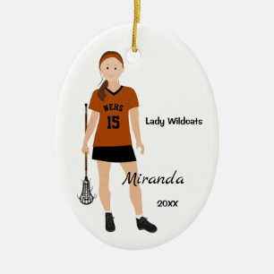 Brünetter Lacrosse-Player in Orange und Schwarz Keramik Ornament