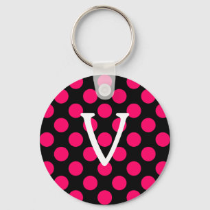 Buchstabe V auf schwarzen rosa Punkten Schlüsselanhänger