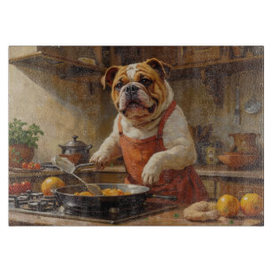 Bulldog kocht in der Küche Schneidebrett