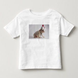 Bulldoggen-Welpen-tragende Weihnachtsmannmütze Kleinkind T-shirt