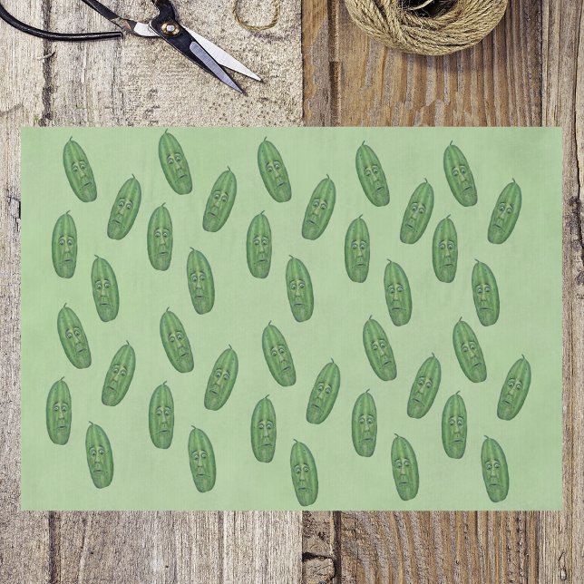 Bunch of Funny Green Pickles Surprised Faces green Seidenpapier (bunch of funny green pickles with surprised looking faces on light green wrapping tissue paper.)