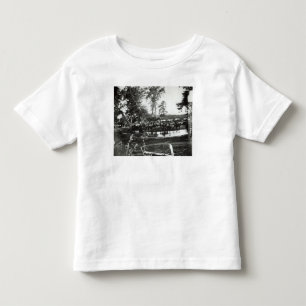 Bundesstaatliche Batterie, die ein Steuerbares auf Kleinkind T-shirt