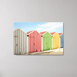 Bunte Hütten auf Strand Leinwanddruck