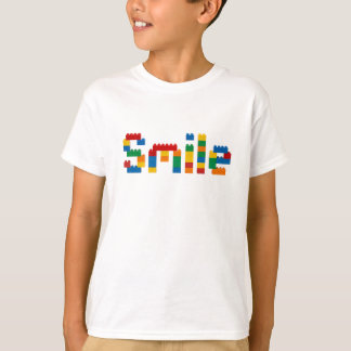 Bunte Spielzeugsteine Smile-Typografie Kinder-T-Sh T-Shirt