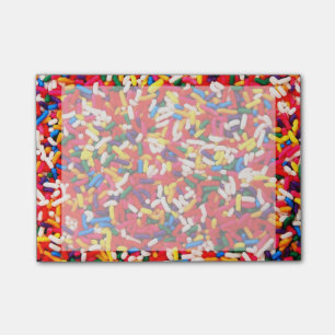 Bunte Süßigkeit besprüht Post-it Klebezettel