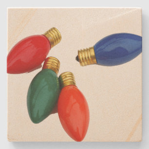 Bunte Weihnachtsglühlampen Steinuntersetzer