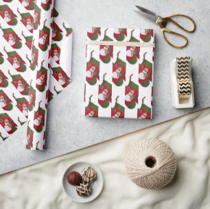 Bunter Schneemann auf Weihnachtsstrumpf-Muster Geschenkpapier