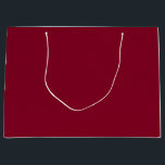 Burgundy Große Geschenktüte<br><div class="desc">Burgundy is a deep, rich color that blends dark red with undertones of purple and sometimes brown. It is often described as sophisticated, luxurious, and warm, similar to the color of red wine from the Burgundy region of France. Characteristics Hue: A purplish-red or reddish-purple that is darker and warmer than...</div>