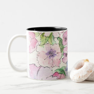 Bursten Sie auf einer Tasse