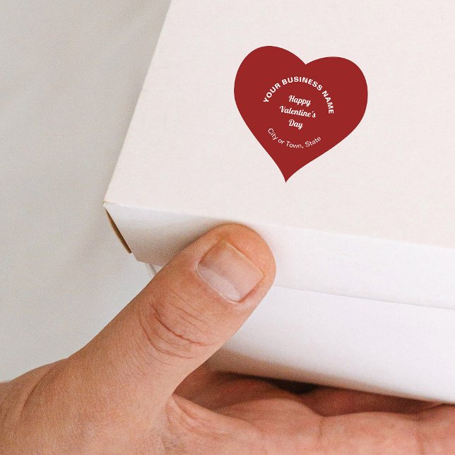 Business Valentine Gruß auf Rote Herzklammer Herz-Aufkleber (Business Valentine heart shape red sticker on small box.)