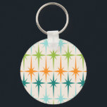 Button-Schlüsselanhänger für Vintage geometrische Schlüsselanhänger<br><div class="desc">Vintag. Geometrien Sternexplosionen. Wenn Sie eines dieser Wörter Liebe, ist dieser Retro-Schlüsselanhänger für Vintage geometrische Sternexplosionen Button für Sie. Dieses moderne Design aus der Mitte des Jahrhunderts besticht durch einen cremefarbenen Hintergrund mit Reihen von türkisfarbenen, limatgrün, orangen und aquamarinen Sternexplosionen. Dieses Mod-Design verbindet sich wunderbar mit dem Retro Atomic Mobile...</div>