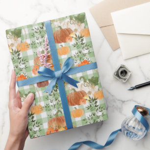 Cadeau Citrouilles sur le papier d'emballage blanc et ver