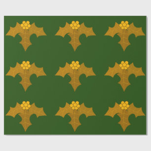 Cadeau Gold Holly sur papier d'enveloppement vert foncé