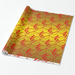 Cadeau Noel rouge sur papier d'enveloppement de Noël or