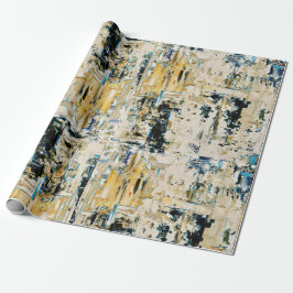 Cadeau Or parmi le papier d'emballage de gravier