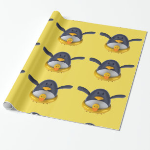 Cadeau Pingouin avec un papier d'emballage brillant de