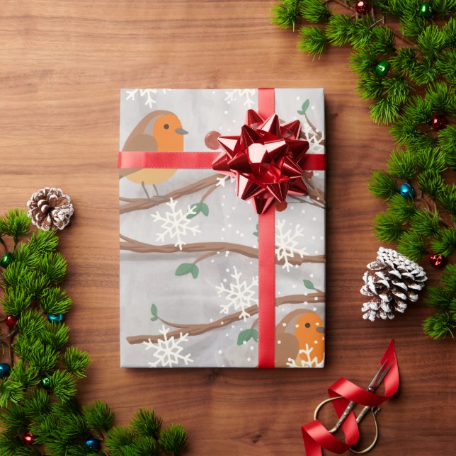 Cadeau Robin dans le papier d'enveloppement de neige (Cadeau de vacances)