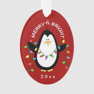 Cadeau rouge lumineux de n de pingouin de Noël