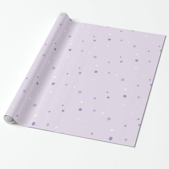 Cadeau teintes de points violets enveloppant du papier (Déroulé)