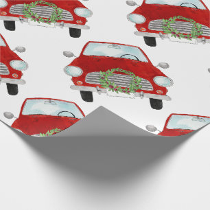 Cadeau Voiture rouge avec papier enveloppant de couronne 
