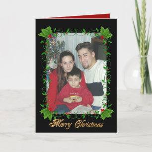 Cadre de houx de carte de voeux de Noël sur le