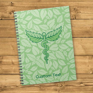 Caduceus mit Blätter Hintergrund Notizbuch Notizblock