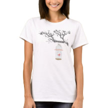cage à oiseaux sur le T-shirt de branche