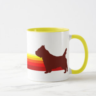 Cairn Terrier avec la tasse de rayures