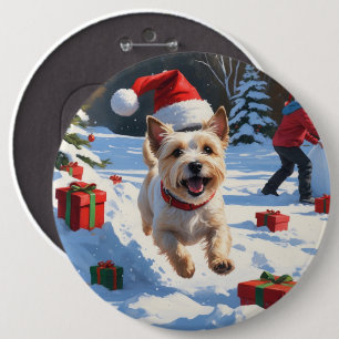 Cairn Terrier läuft in Snow mit Weihnachtsmütze Button