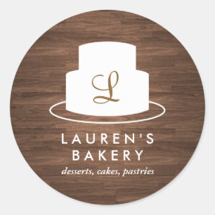 Cake Monogram Logo in Weiß auf Braunholz Runder Aufkleber