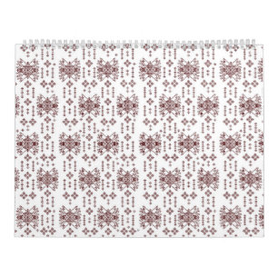 Calendrier un arrière - plan blanc avec un motif rouge dessus