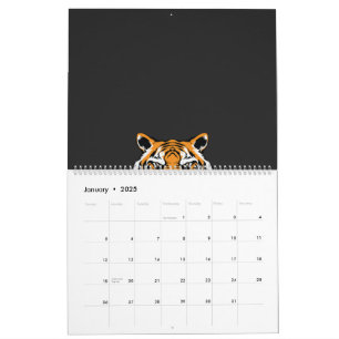 Calendrier un gros plan du visage d'un tigre sur un arrière -