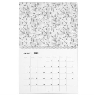 Calendrier Un motif floral noir et blanc raffiné, mettant en