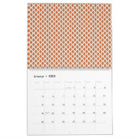 un motif géométrique orange et blanc